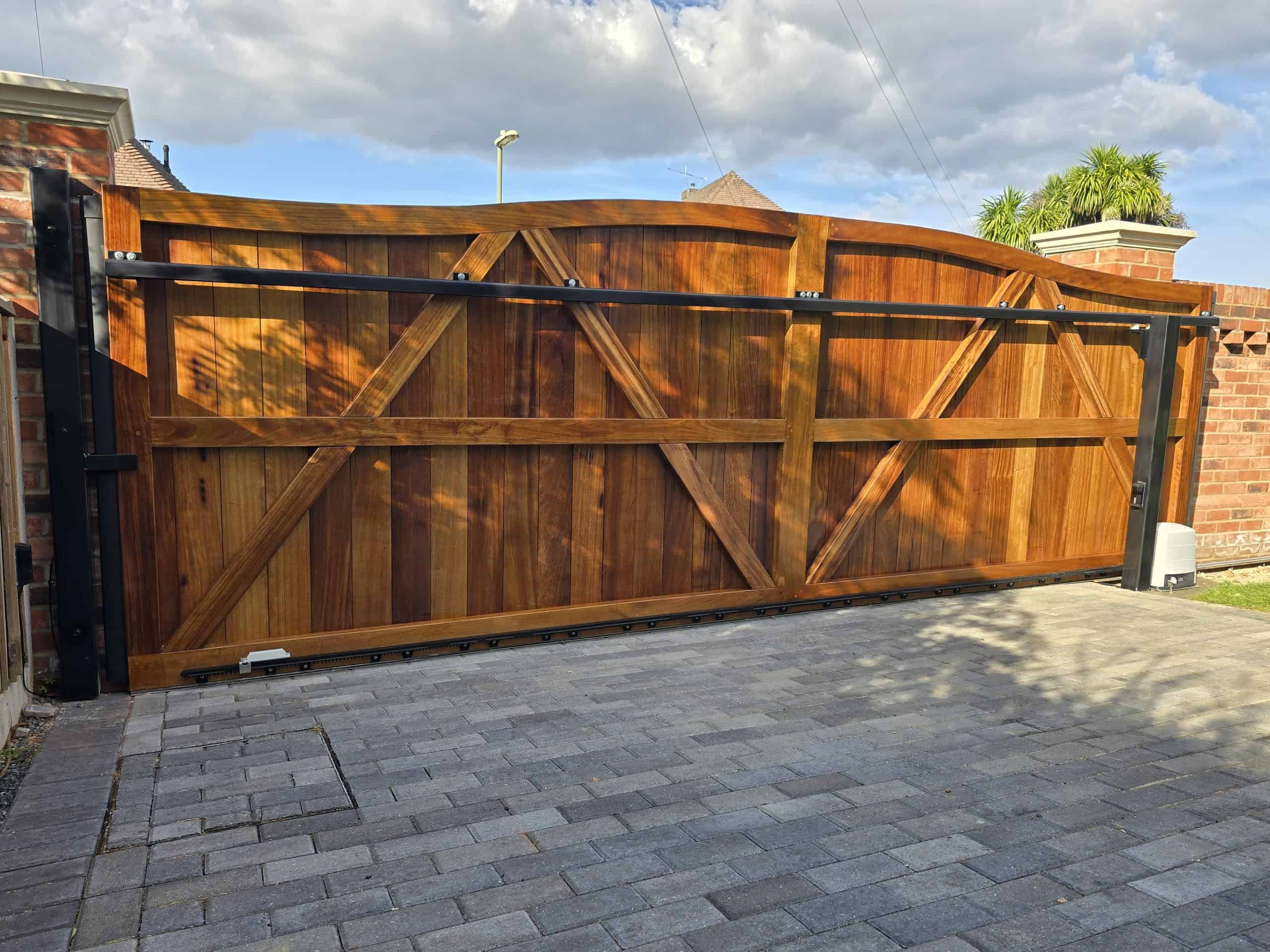 Timber clad sliding driveway gates Hampshire